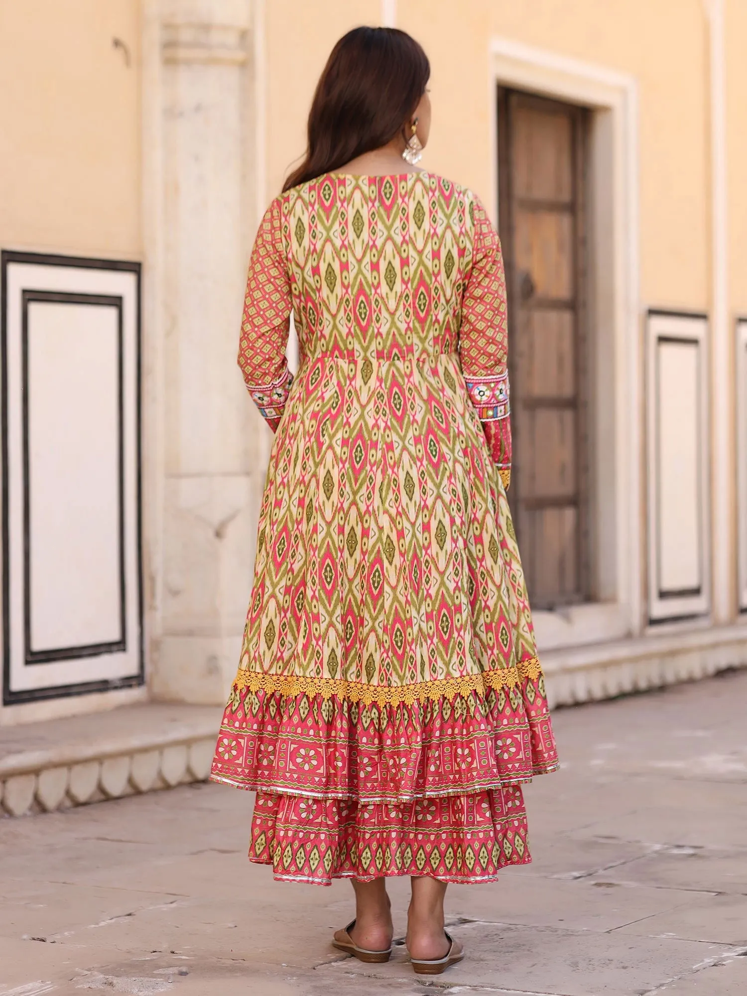 Jashvi Green Cotton Ikat Printed Layered Maxi Dress With Thread Embroidery & Dori Tassel Tie-Up At Waist