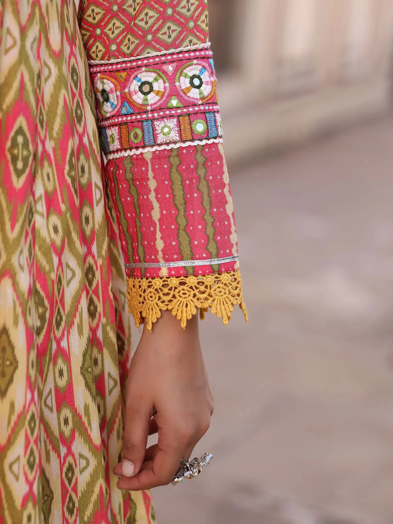 Jashvi Green Cotton Ikat Printed Layered Maxi Dress With Thread Embroidery & Dori Tassel Tie-Up At Waist