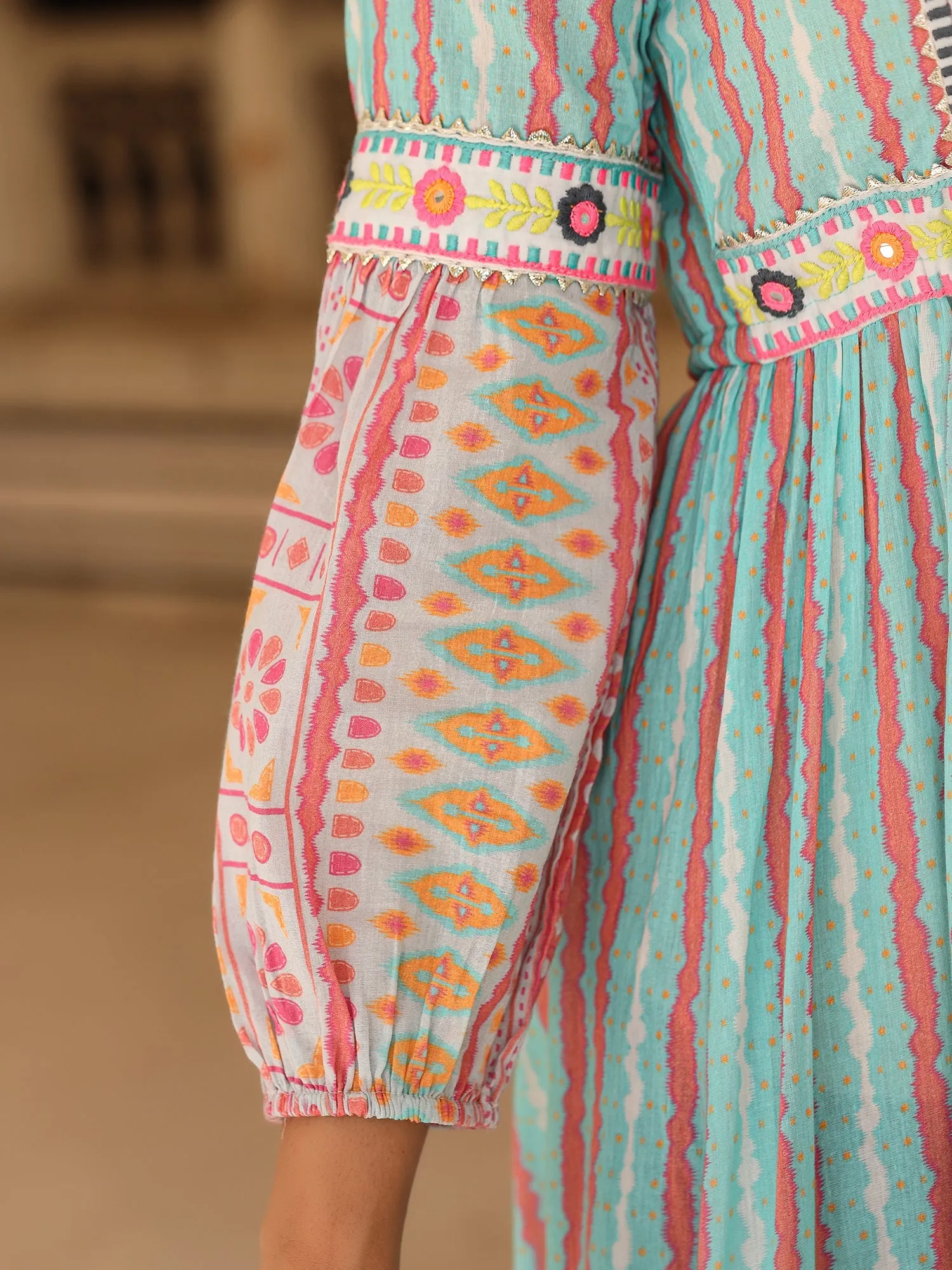 Jashvi Sky Blue Ikat Cotton Printed Tiered Maxi Dress With Thread Embroidery & Dori Tassel Tie-Up At Waist